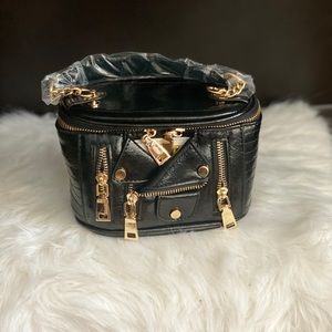 Love X. Clusively Handbag